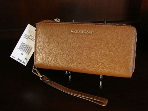 michael michael kors pebbled leather continental wristlet|Leather Continental Wristlet .